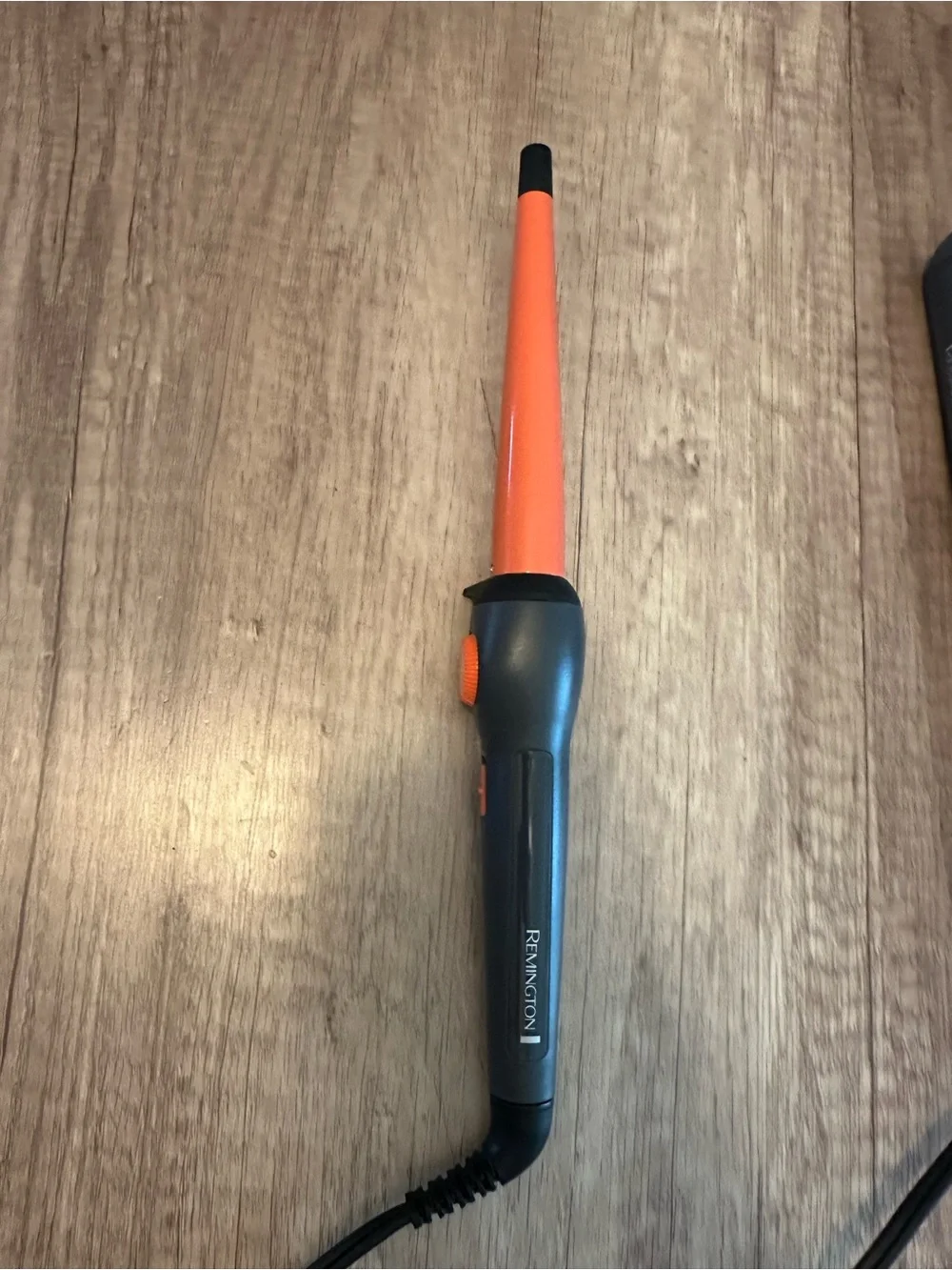Remington curling iron and protective glove. Like new condition.